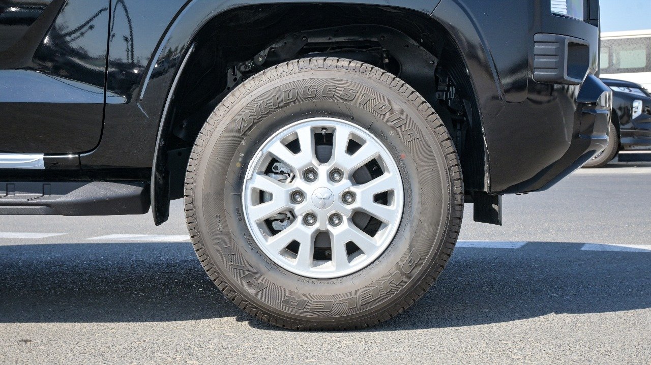 Make - Mitsubishi Model - L200 Year - 2026 Engine - 2.4 L 4G64 Fuel - Petrol Transmission- Manual Body type - Normal Drive - 4WD Doors- 4 doors Windows - Electric Power Specs - GCC Sale - Export Only Shipping from - Dubai UAE - Image 8